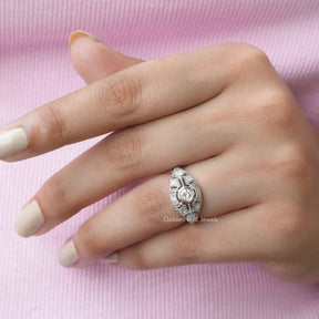 [in finger front view of moissanite round cut engagement ring]-[Golden Bird  Jewels]