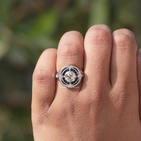 [This halo moissanite ring made of round and tapper baguette cut moissanites]-[Golden Bird Jewels]