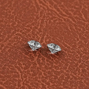Close-Up View of Old European Round Cut Diamond Pair In White