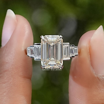 Sterling silver five-stone ring with a large emerald-cut clear center stone and baguette side stones