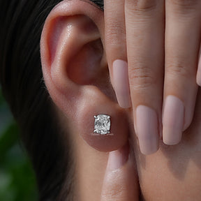 Side view of solitaire cushion cut lab diamond stud earrings 