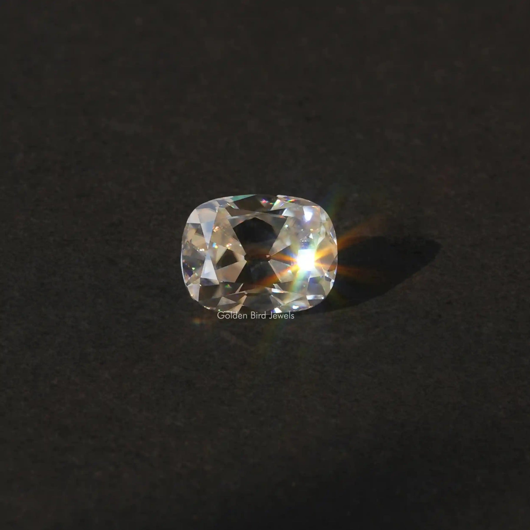 [Front view of old mine cushion cut loose stone made of near colorless]-[Golden Bird Jewels]