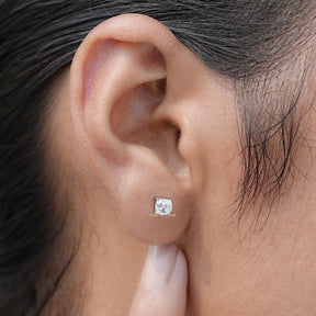 Front view of cushion shaped moissanite stud earrings