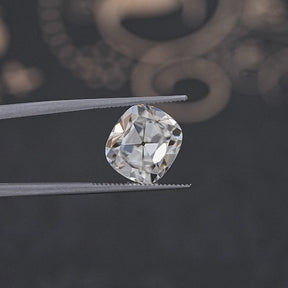 In Tweezer View Of Old Mine Cushion Cut Loose Moissanite Stone