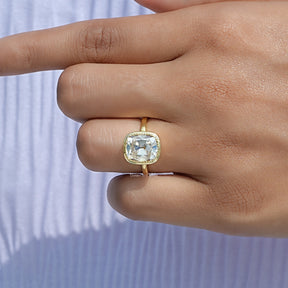View of Cushion Cut Moissanite Ring In Yellow Gold