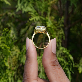Side view of cushion cut moissanite Ring in yellow gold
