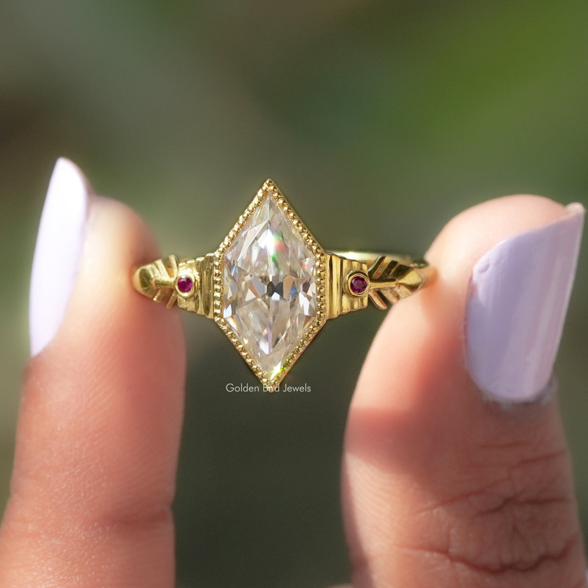 [In two finger front view of old mine dutch marquise cut moissanite ring]-[Golden Bird Jewels]
