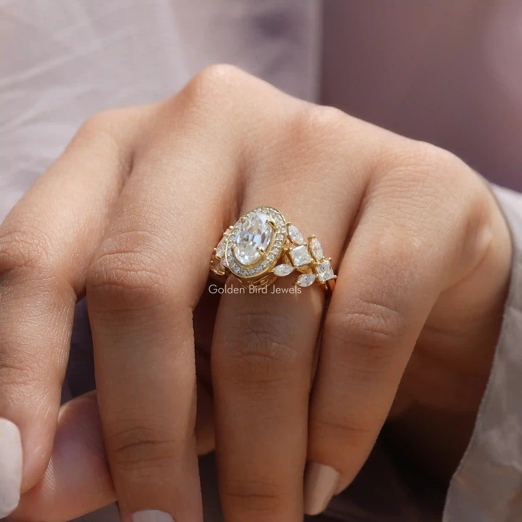 [Halo style old mine moval cut moissanite cluster ring at golden bird jewels]