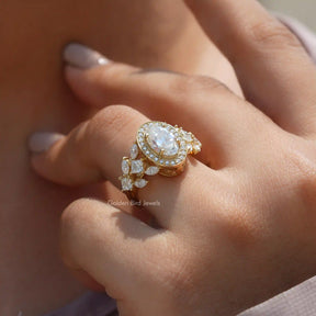 [Old mine moval cut moissanite halo engagement ring made of marquise cut stones]