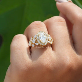 [This old mine moval cut cluster engagement ring set in prong]