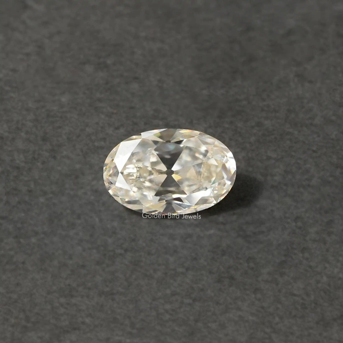 [Front view of old mineoval cut loose moissanite]-[Golden Bird Jewels]