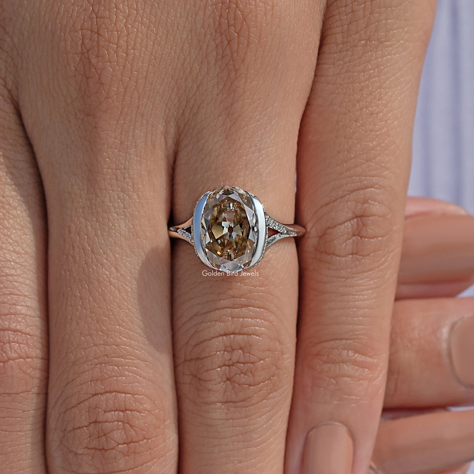 Old Mine Oval Cut Half Bezel Engagement Ring