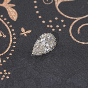 Off White Old Mine Pear Loose Moissanite