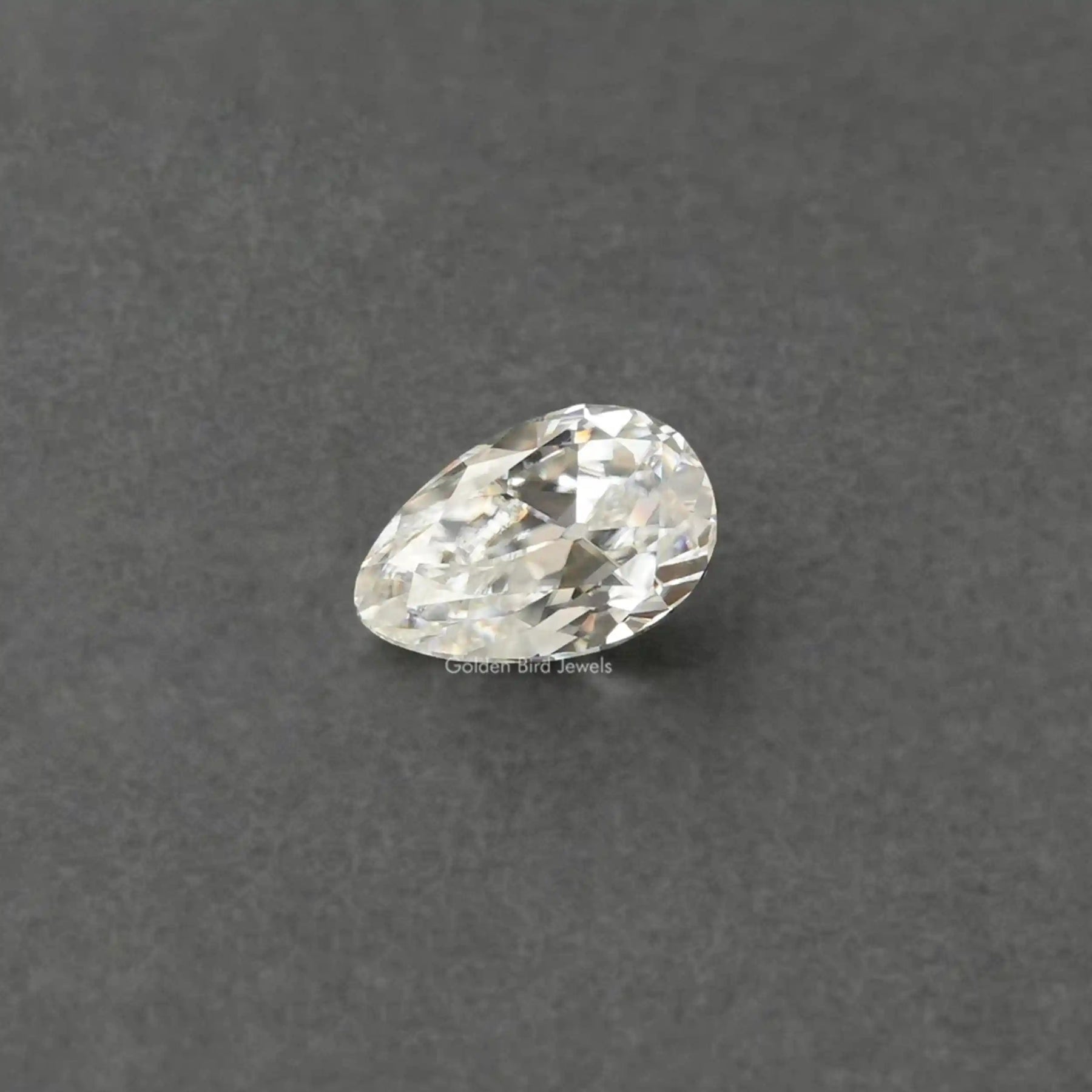 [This old mine pear cut moissanite loose stone crafted with VVS clarity]-[Golden Bird Jewels]