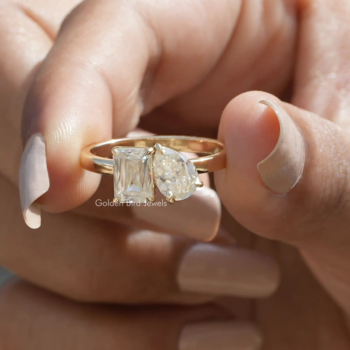 [In two finger front view of old mine pear cut moissanite ring made of 18k yellow gold]-[Golden Bird Jewels]