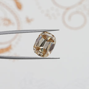 In Tweezer View Of Old Mine Cushion Cut Loose Moissanite Stone
