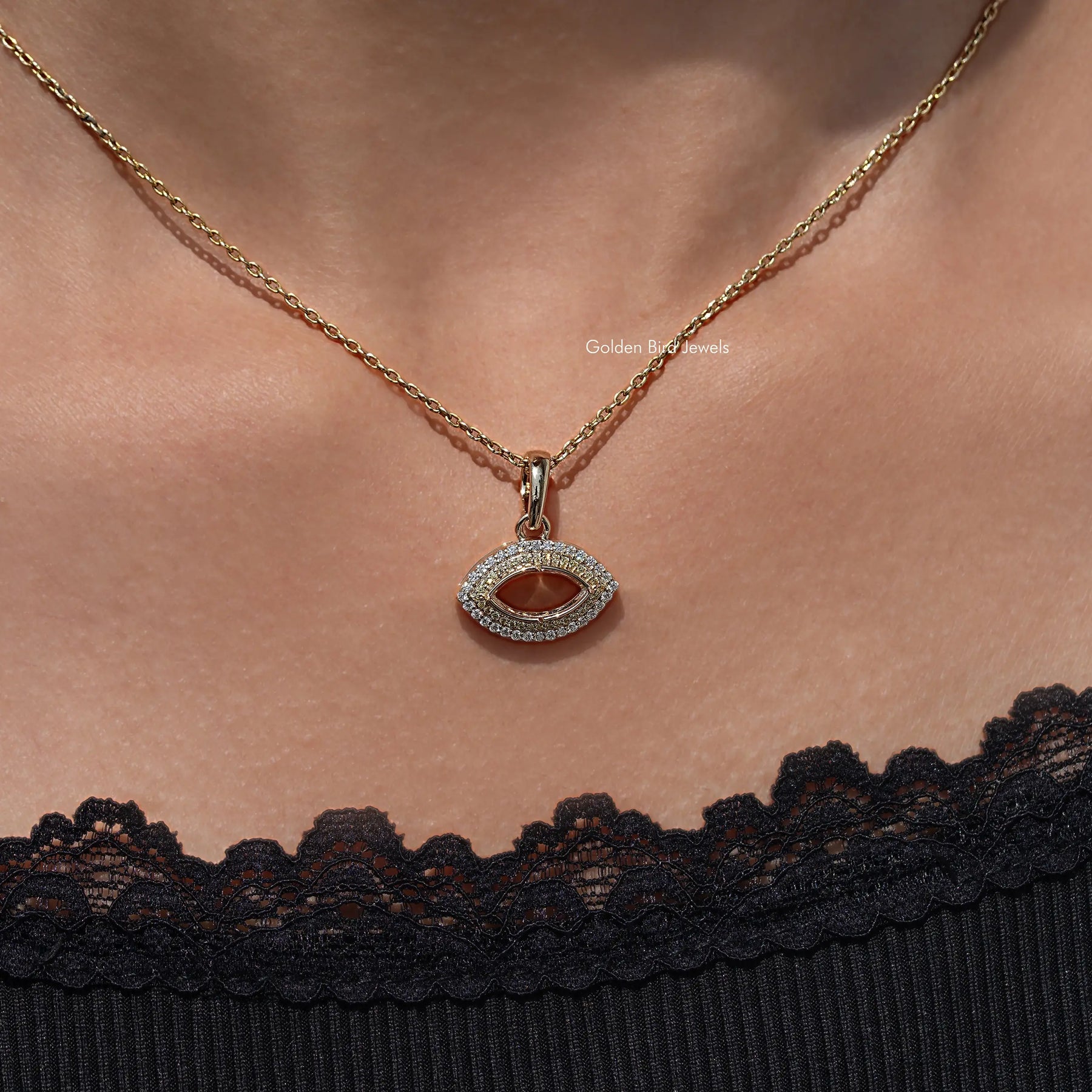 In Side view of moissanite Pear cut pendant