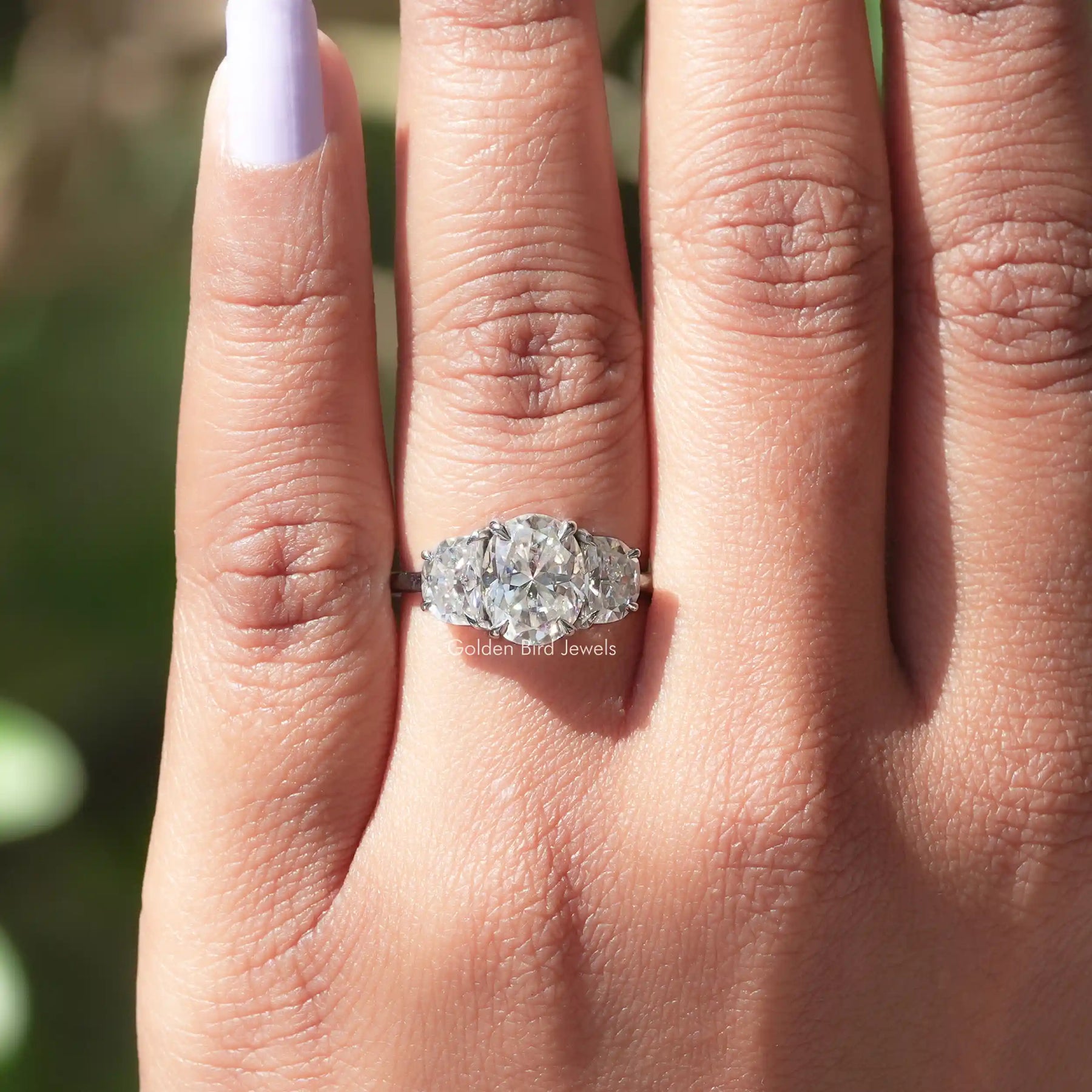 Oval Cut and Half Moon Moissanite Ring