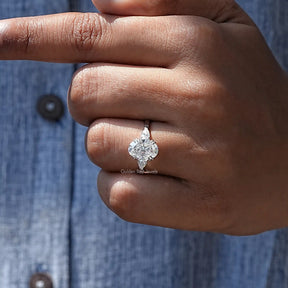 Close-Up View of Oval And Pear Cut Moissanite Ring In White Gold