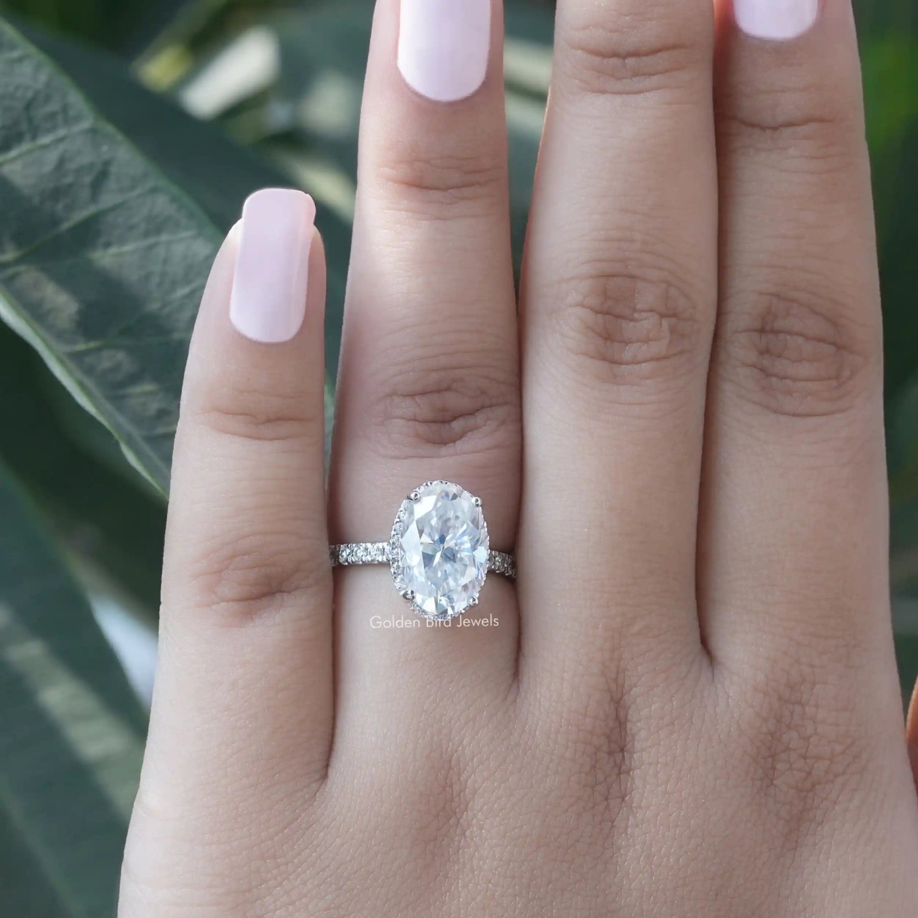 Oval hidden best sale halo engagement ring