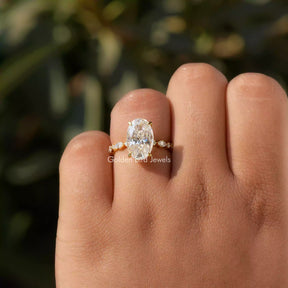 [In finger front view of oval cut accent stone ring]-[Golden Bird Jewels]