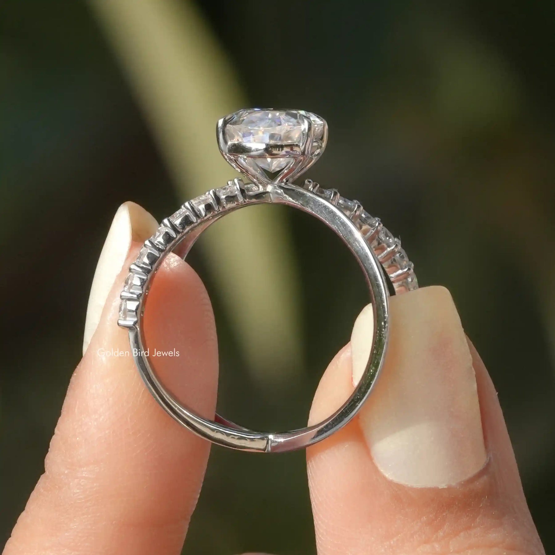 [Side view of oval cut moissanite engagement ring]-[Golden Bird Jewels]