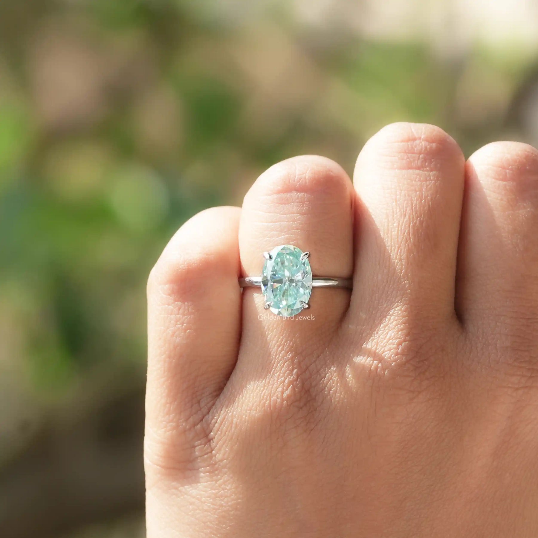 Blue Oval Cut Moissanite Solitaire Ring