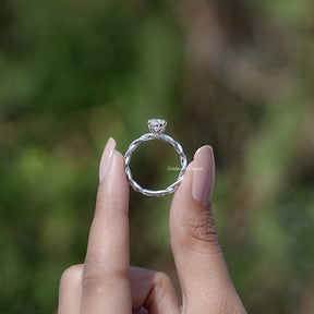 Oval Shaped Moissanite Twisted Shank Accent Ring