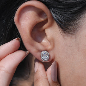 Front View of Round Cut Diamond Halo Stud Earrings In White Gold