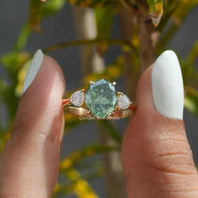 [This oval cut moissanite ring set in three stones]-[Golden Bird Jewels]