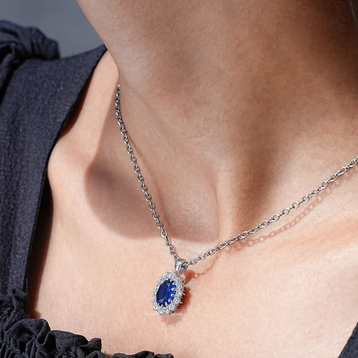 In neck view of lab grown gemstone oval cut  halo pendant 