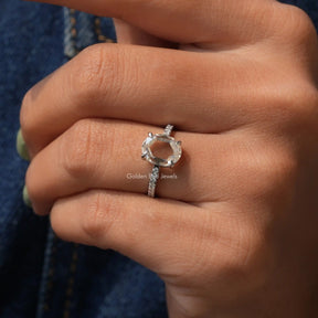 Detailed View Of Oval Cut Moissanite Accent Stone Ring In White Gold
