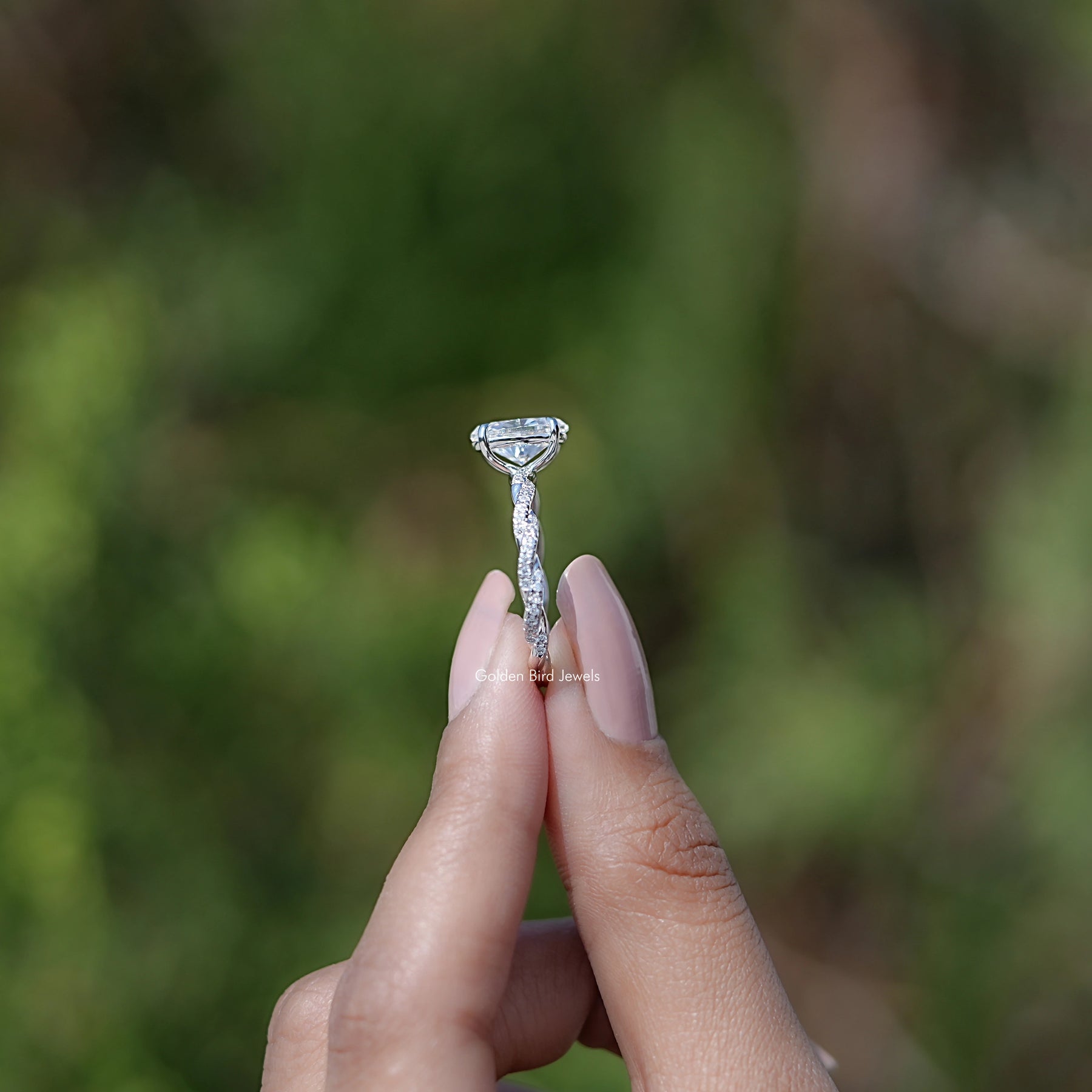 Oval Shaped Moissanite Twisted Shank Accent Ring