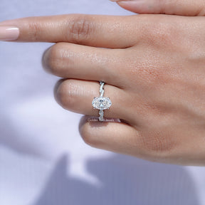 Oval Shaped Moissanite Twisted Shank Accent Ring