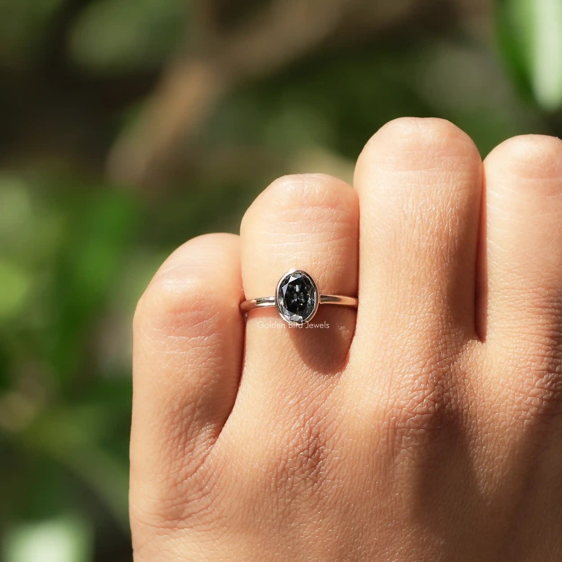 Bezel Set Oval Shaped Moissanite Solitaire Ring