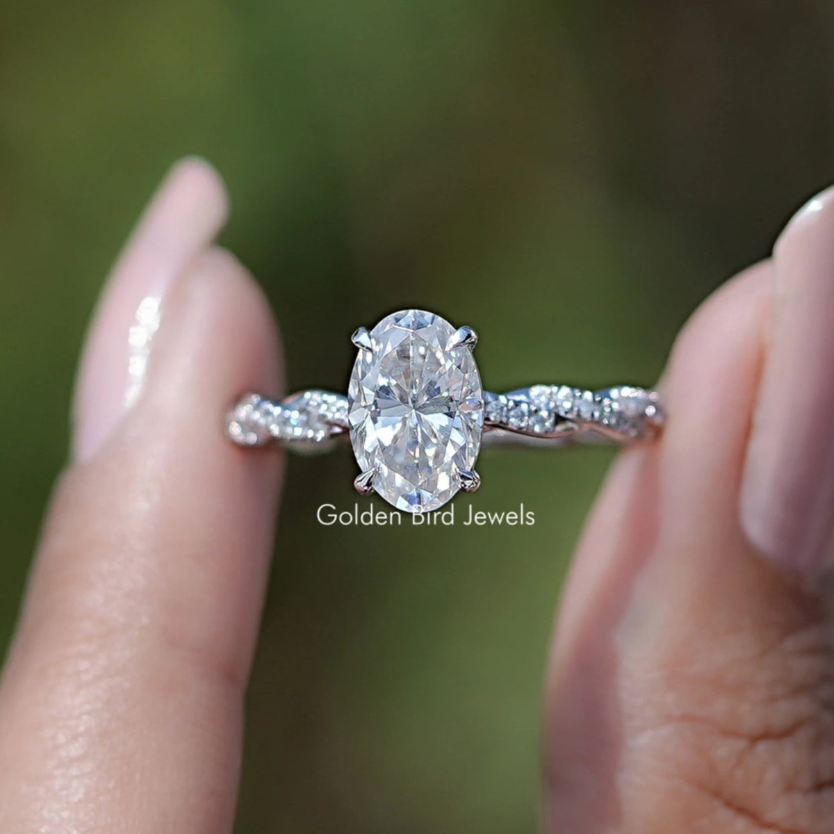 Oval Shaped Moissanite Twisted Shank Accent Ring