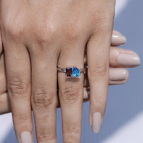In finger front view of Two Stone Moissanite Engagement Ring in unique shape
