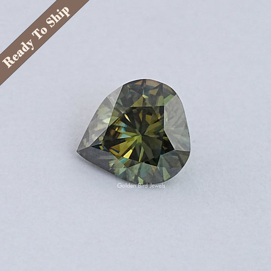 Pear-cut dark green moissanite loose stone with faceted teardrop shape