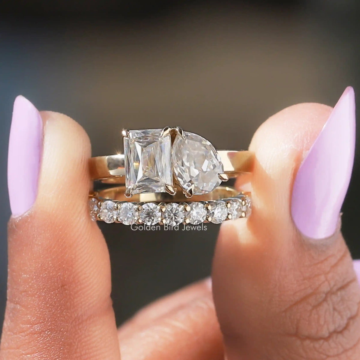 Front View of Pear And Criss Cut Ring With Matching Band In two Fingers