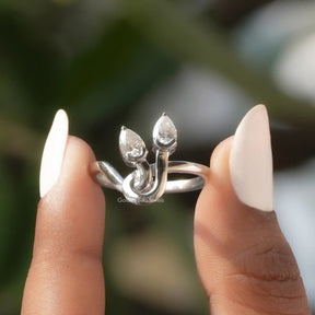 Front View of Pear Colorless Moissanite Vintage Style Toi Moi Ring In two Fingers