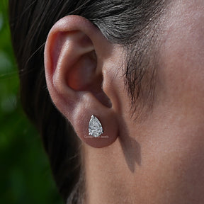 In-ear close view of lab diamond stud earrings 