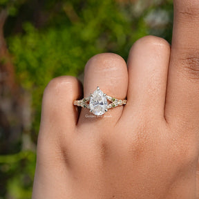 Pear Cut Moissanite Accent Engagement Ring
