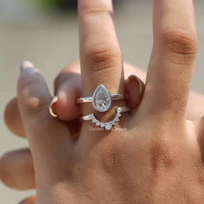 View of Pear Cut Moissanite Bridal Ring Set In Finger