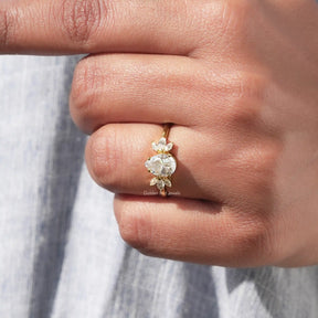 View of Marquise And Pear Cut Engagement Ring In Yellow Gold
