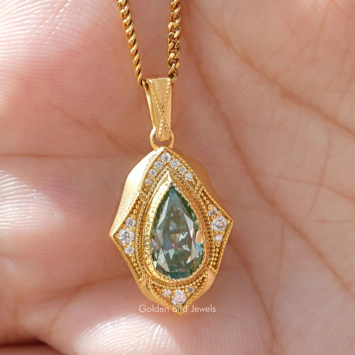 Front view of pear cut moissanite pendant 