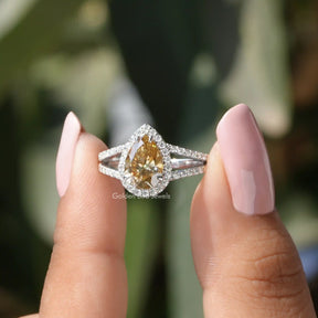 [In two finger front view of pear shaped moissanite ring]-[Golden Bird Jewels]