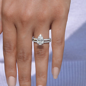 Close-Up View of White Gold Pear Cut Wedding Ring Set