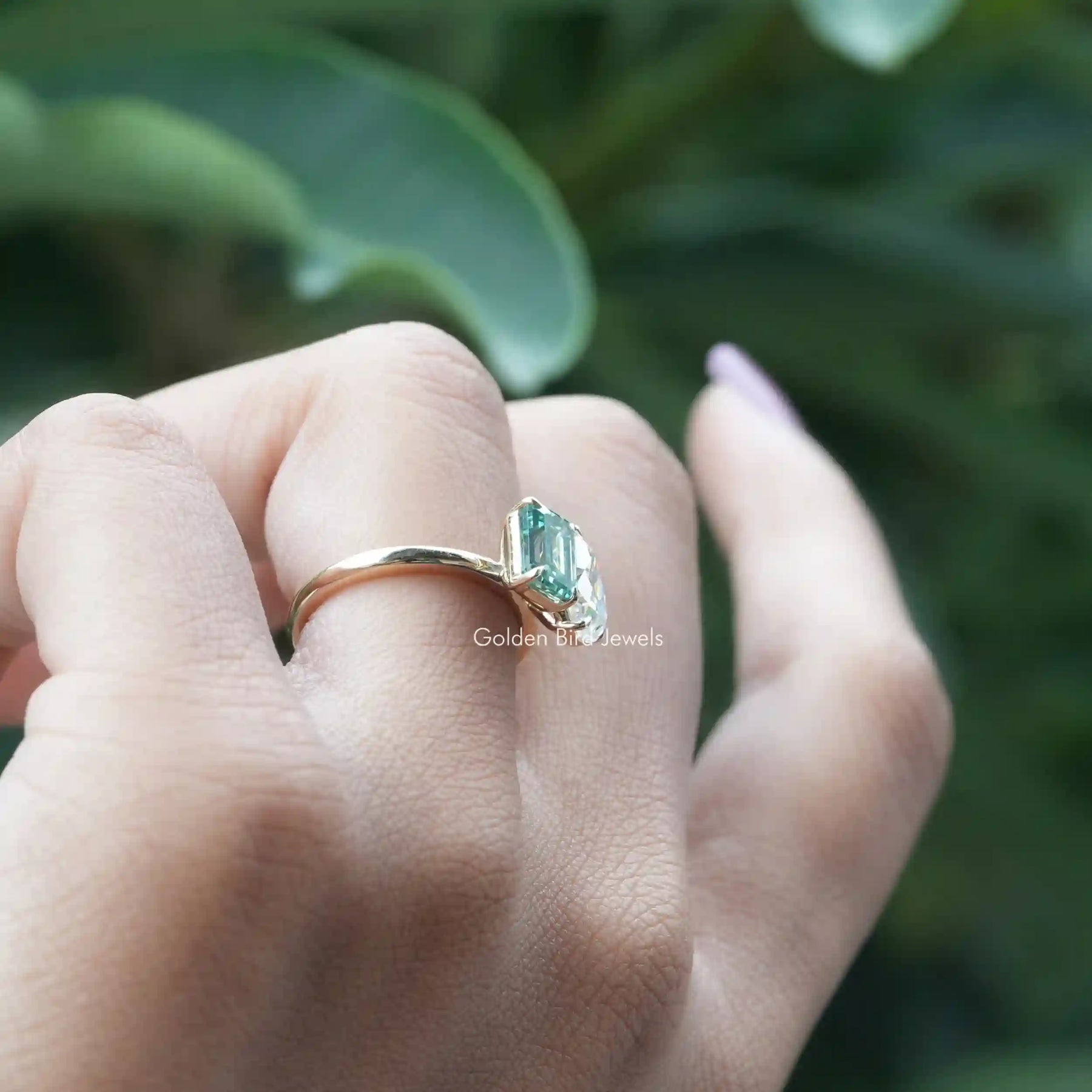 [In Finger a Colorless Pear And Aqua Blue Emerald Cut Moissanite Two Stone Ring]-[Golden Bird Jewels]