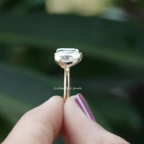 [In Finger a Solid Gold Moissanite Engagement Ring]-[Golden Bird Jewels]