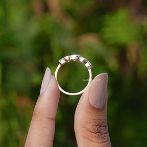 Back View of Pentagon And Round Cut Lab Diamond Five Stone Ring In two fingers